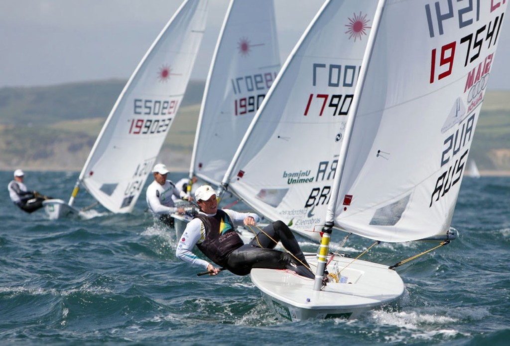 Tom Slingsby from Australia racing in the Laser class on day 2 of the Skandia Sail for Gold Regatta, in Weymouth and Portland, the 2012 Olympic venue. © onEdition http://www.onEdition.com